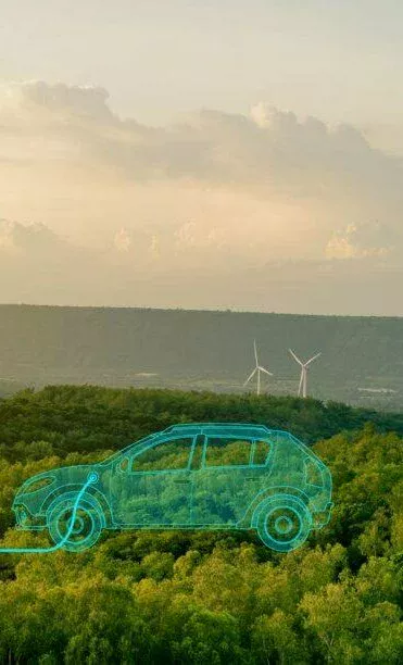 Des éoliennes dans un paysage verdoyant