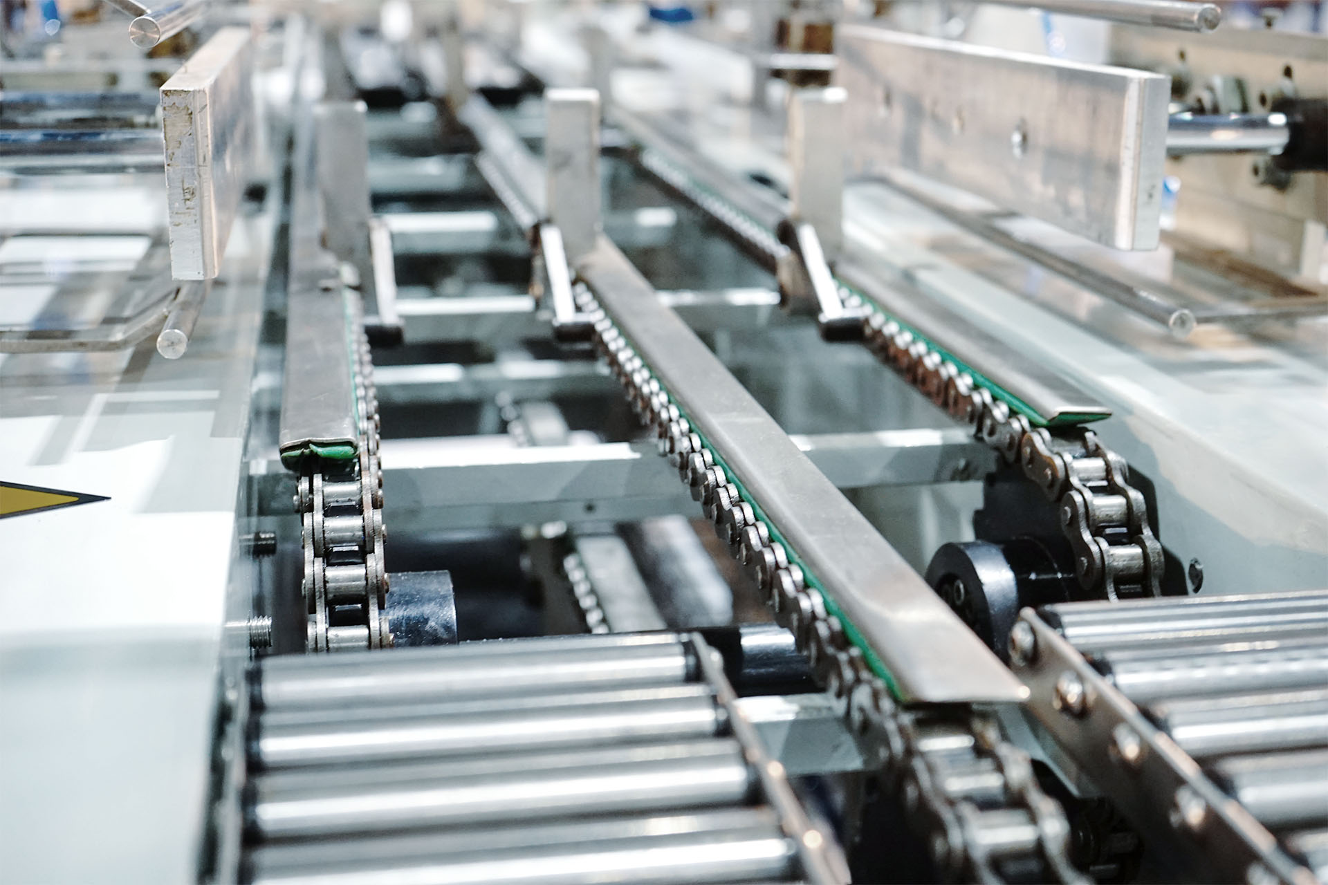 Close up of chains in a conveyor belt