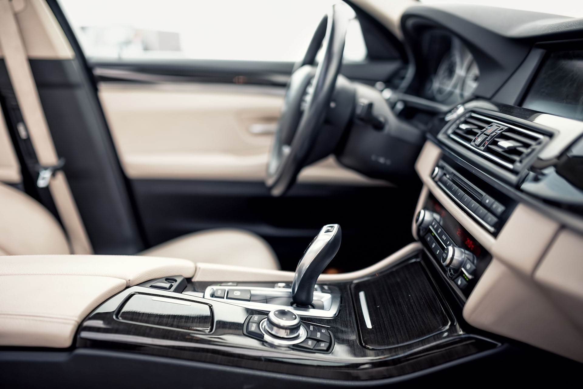 Interior of car with armrest and cockpit 