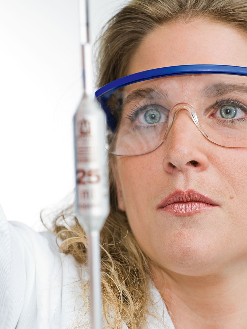 BECHEM laboratory employee with protective goggles