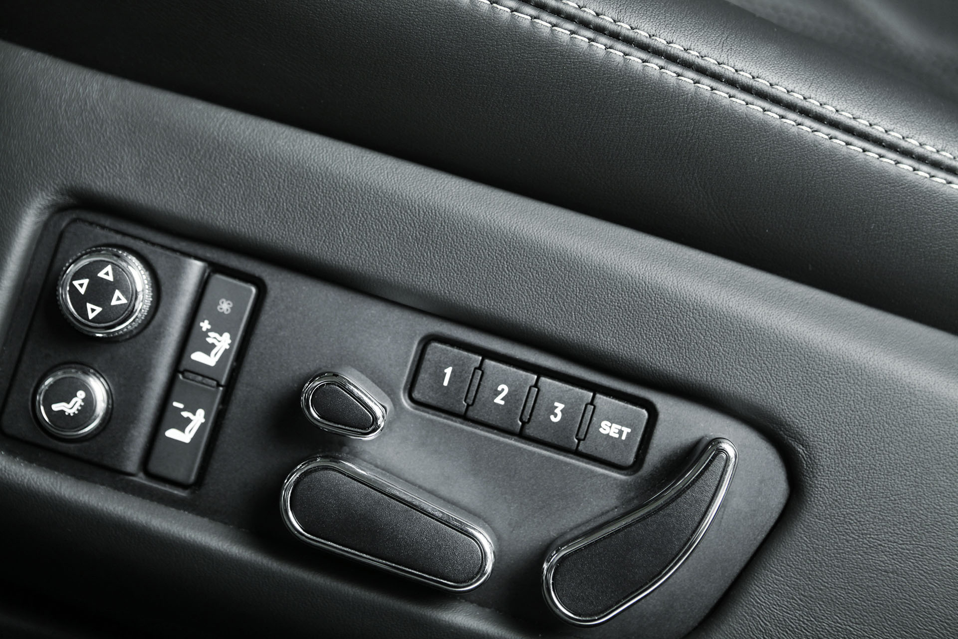 Detail of the seat controller in the car 