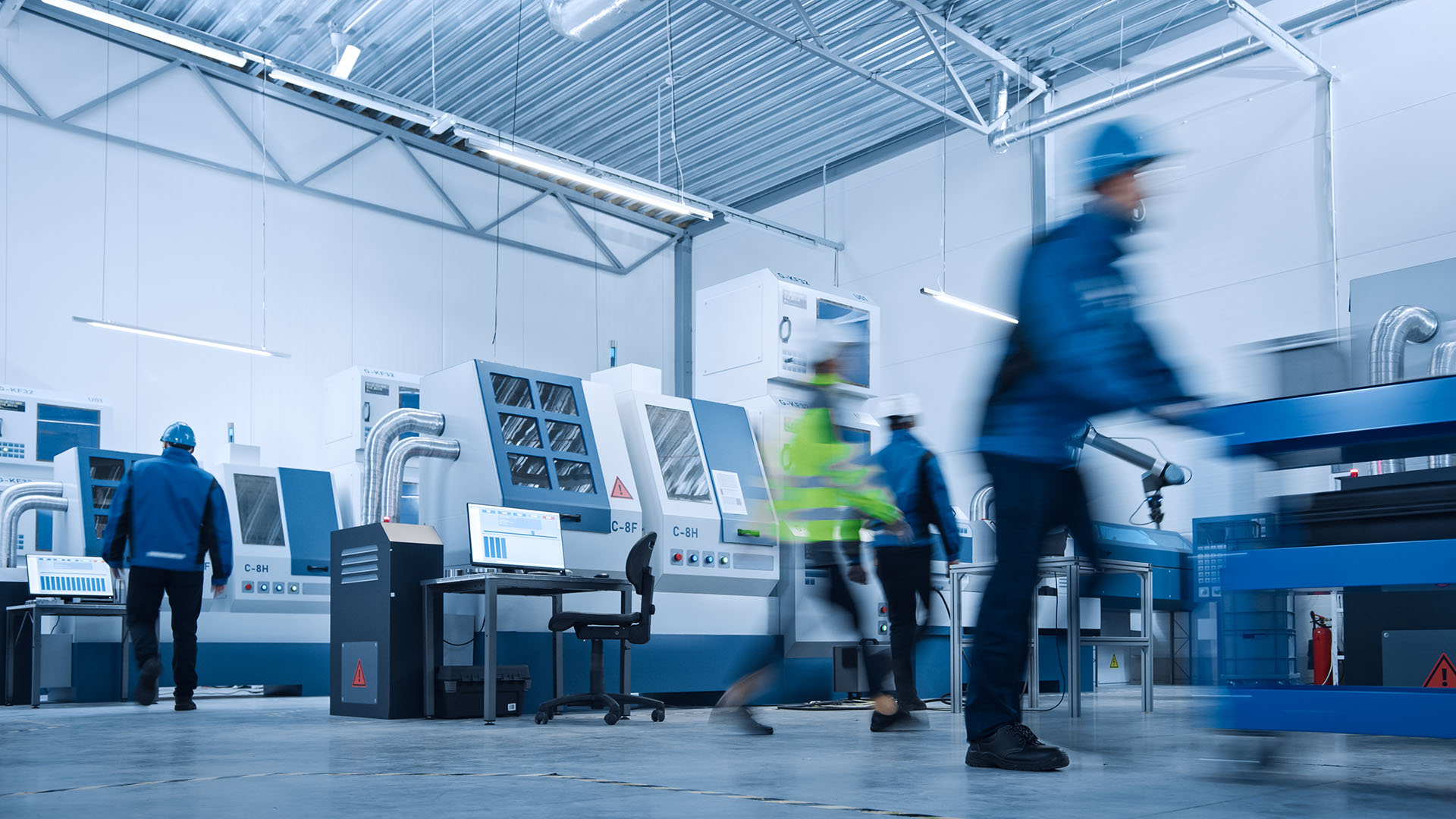 People working in safety suits