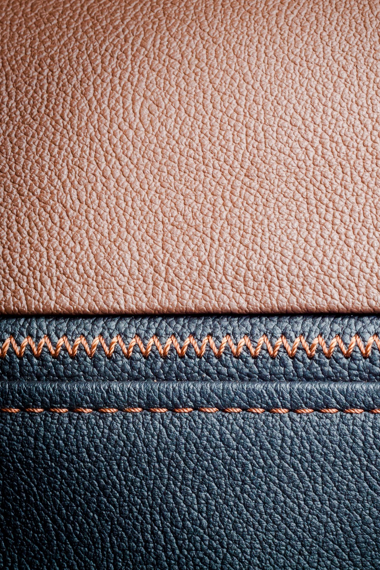 Brown leather and black leather with brown stitching